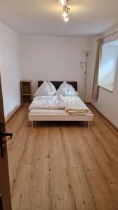 Ένα ή περισσότερα κρεβάτια σε δωμάτιο στο Ferienwohnung Stabentheiner