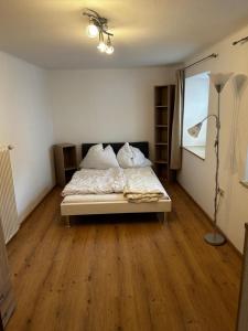 Ένα ή περισσότερα κρεβάτια σε δωμάτιο στο Ferienwohnung Stabentheiner