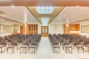 a large room with chairs and a podium in a classroom at VITS Select Nashik in Nashik