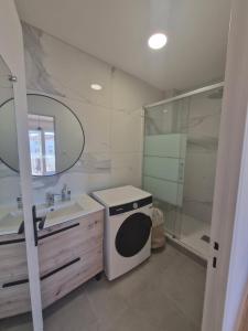 Koupelna v ubytování Agréable T2 a 3mn de la mer parking wifi