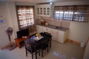 Kuchyň nebo kuchyňský kout v ubytování RQS Hostel