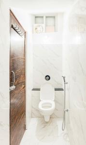 Et badeværelse på Darshan home Prime Connected Location