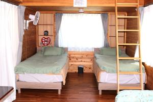 Ένα ή περισσότερα κρεβάτια σε δωμάτιο στο La prima stella - Vacation STAY 54161v