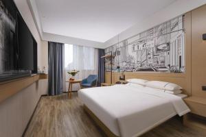 Кровать или кровати в номере City Comfort Inn Suzhou Wujiang Development Zone Yundong +95 фотографий