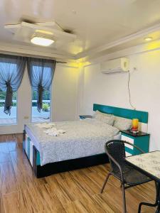 Una cama o camas en una habitación de Couple room C in Final Destination Resort