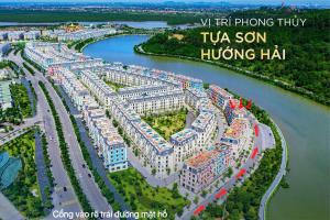 an aerial view of a building next to a river at Kapás Hotel in Hai Phong +11 photos