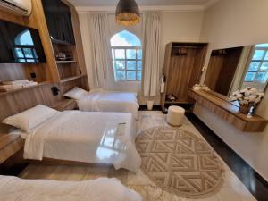 Postel nebo postele na pokoji v ubytování East Coast Vacation Homes