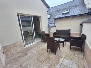 En balkon eller terrasse på La Parenthèse Rabelaisienne