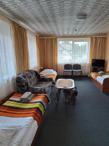 Postel nebo postele na pokoji v ubytování Jeruzale Hotel