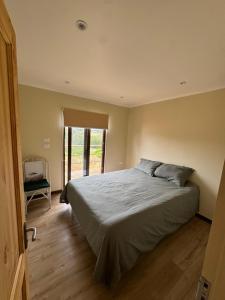 Ένα ή περισσότερα κρεβάτια σε δωμάτιο στο Casa Pangal Cahuil