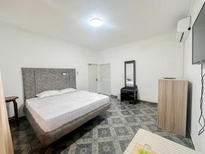 Ένα ή περισσότερα κρεβάτια σε δωμάτιο στο Cloud Nest Hanthana +9 φωτογραφίες