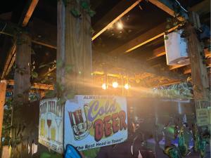 a drink beer sign on the side of a building at The Executive Suite in Lagos +14 photos