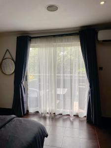 Ένα ή περισσότερα κρεβάτια σε δωμάτιο στο The Executive Suite +15 φωτογραφίες