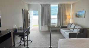 Телевизор и/или развлекательный центр в The Georgian Resort