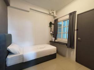 En eller flere senge i et værelse på Gather lnn