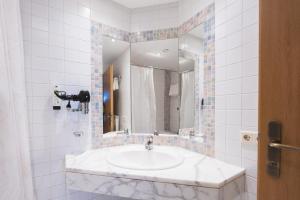 Koupelna v ubytování Hotel Gruberhof Innsbruck Igls B&B