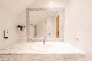 Koupelna v ubytování Hotel Gruberhof Innsbruck Igls B&B + 115 fotografií