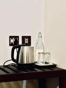 Kaffe- og tefaciliteter på Rayz inn beach resort new