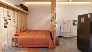 Ένα ή περισσότερα κρεβάτια σε δωμάτιο στο 허브스테이