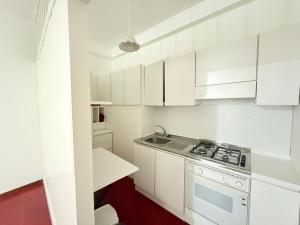 Nhà bếp/bếp nhỏ tại Trilocale in centro a Sirolo +10 ảnh