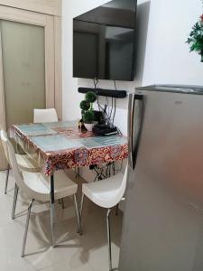 Kuchyň nebo kuchyňský kout v ubytování Rosaland staycation