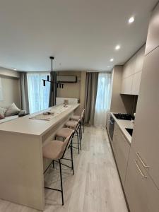 Køkken eller tekøkken på Central Apartment