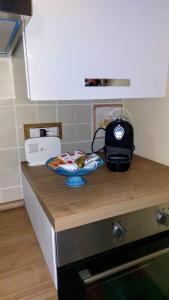 a kitchen counter with a plate of food on it at Casa Zia Maria 6 posti Monterosso Coast to Coast in Monterosso