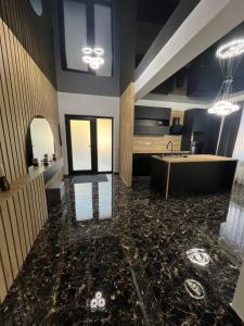 Kuchyň nebo kuchyňský kout v ubytování IUNIk