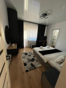 Postel nebo postele na pokoji v ubytování IUNIk