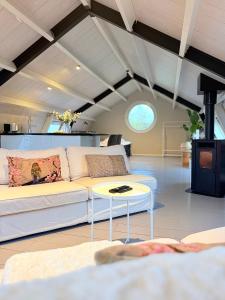 Χώρος καθιστικού στο Natuurhuisje Heeren van Acquoy