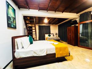 Postel nebo postele na pokoji v ubytování Princess of Dickoya Homestay