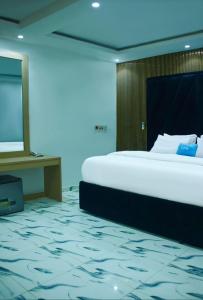 Postel nebo postele na pokoji v ubytování Funfoyer Hotels