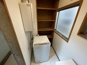 Fotografie z fotogalerie ubytování 伊東駅前ゲストハウス v destinaci Ito