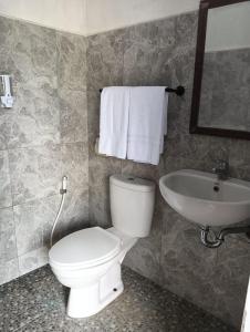 Phòng tắm tại Homestay Gusti