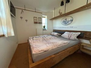 Postel nebo postele na pokoji v ubytování Ferienwohnung mit wundervollen Bergblick