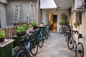 a row of bikes parked on the side of a building at Jeweller Hotel in Ruse
