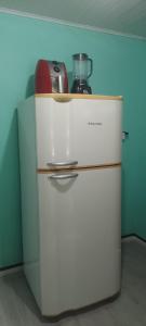 Køkken eller tekøkken på Apartamento em Chácara Aconchegante - Kitnet