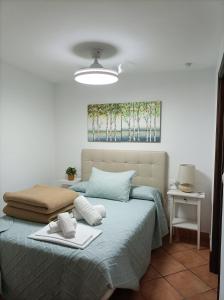 Postel nebo postele na pokoji v ubytování La Casita de Zahara de la Sierra