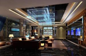 TV a/nebo společenská místnost v ubytování Fangzhong Holiday Hotel