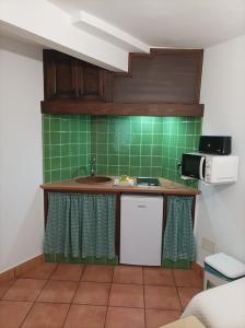 Kuchyň nebo kuchyňský kout v ubytování La Casita de Zahara de la Sierra