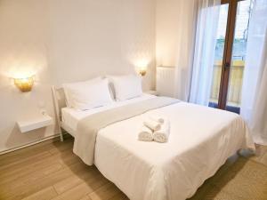 Postel nebo postele na pokoji v ubytování Camelia Luxury Apt