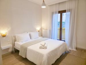 Postel nebo postele na pokoji v ubytování Camelia Luxury Apt