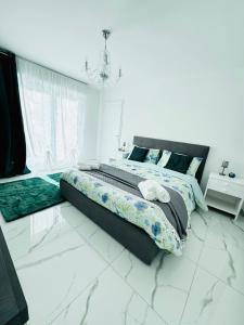 En eller flere senge i et værelse på Villa Amore