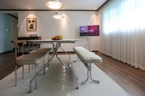 Μια τηλεόραση ή/και κέντρο ψυχαγωγίας στο Hongdae Mangwon 3BR Apartment