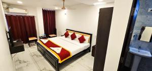 Postel nebo postele na pokoji v ubytování SAADHANA COMFORTS LODGE + 5 fotografií