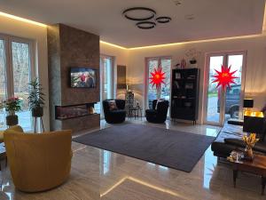 TV a/nebo společenská místnost v ubytování Hotel Asgards Midgard