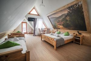 Postel nebo postele na pokoji v ubytování Hotel Eco Tatry Holiday& Spa