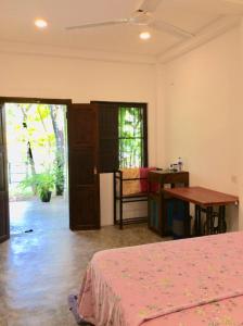 Postel nebo postele na pokoji v ubytování Kadol Villa