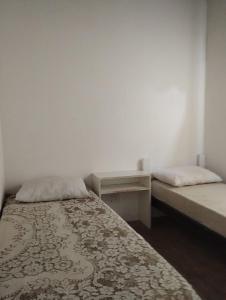 En eller flere senge i et værelse på Casa Valle Verde