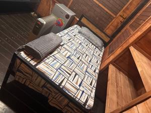 an overhead view of a bed in a room at Tehran mets armenia in Yerevan